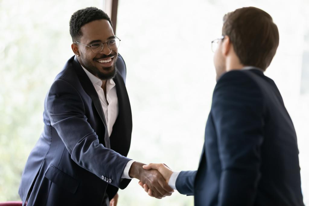 two people shaking hands