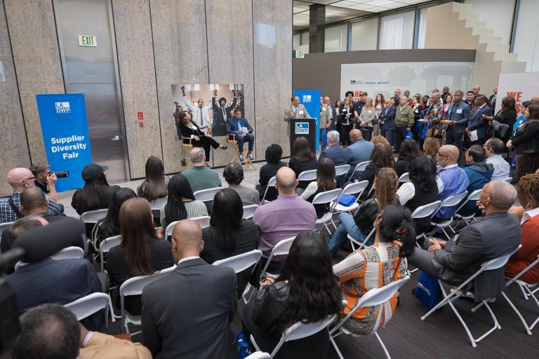 Networking interactions between representatives and event attendees.