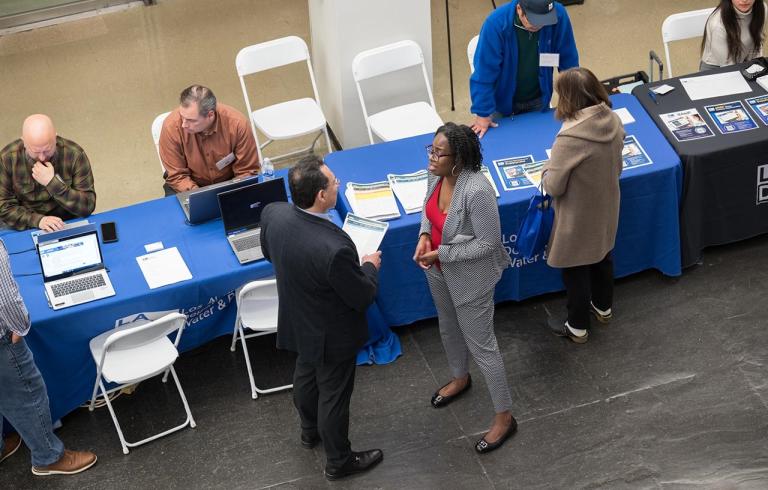 Networking interactions between representatives and event attendees.