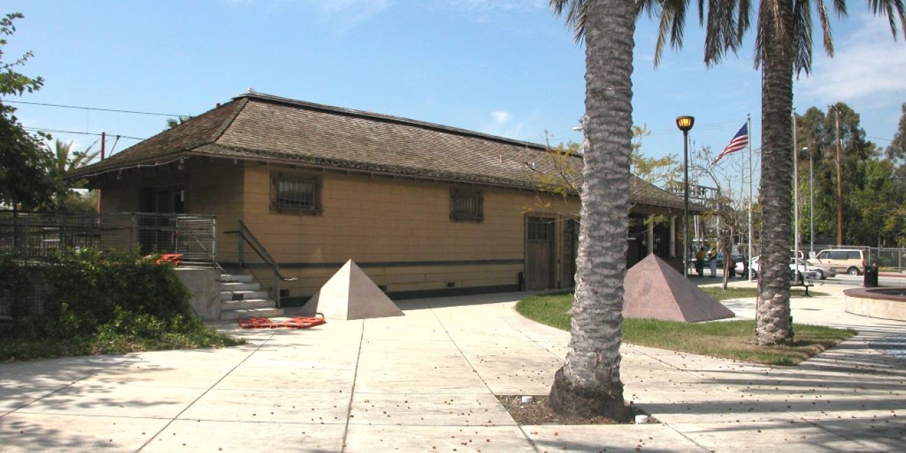 Watts Customer Service Center, housed within the historic Watts Pacific Electric Railway station. View from Park