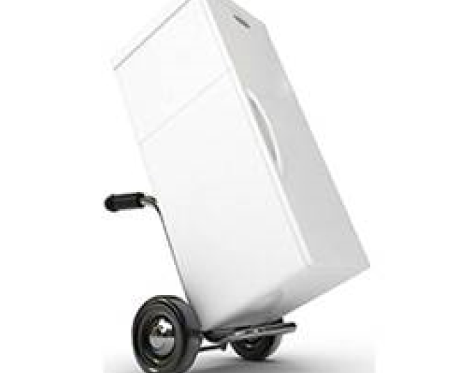 A refrigerator on a wheeled dolly.