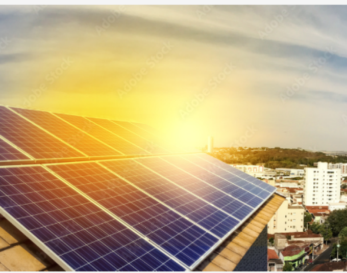 Solar panels on the roof of a residential building on a sunny day.