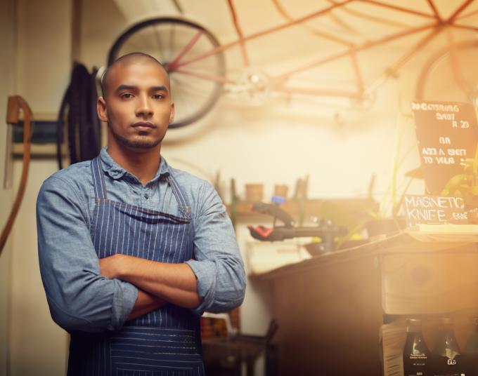 Man standing in bike shop